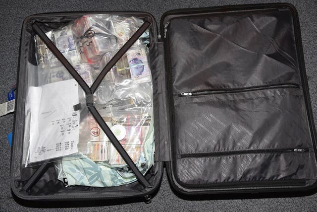 Some of the money found in the possession of Tara Hanlon when she was stopped at Heathrow Airport with suitcases full of cash (National Crime Agency/PA)