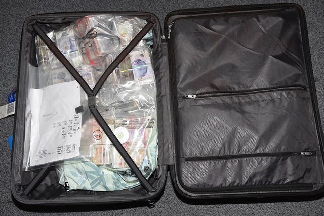 Some of the money found in the possession of Tara Hanlon when she was stopped at Heathrow Airport with suitcases full of cash (National Crime Agency/PA)