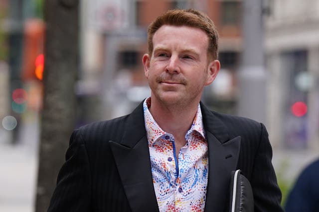 Ex-BBC presenter Alex Belfield arrives at Nottingham Crown Court for trial charged with stalking corporation staff members (PA)
