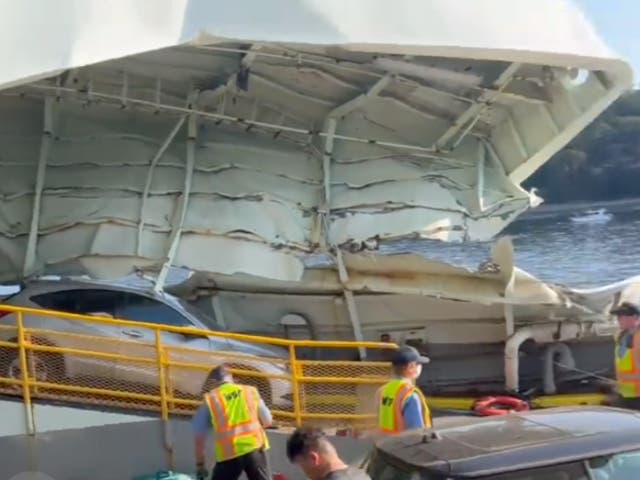 <p>The damaged front deck of a ferry that crashed into a dock in Fauntleroy, West Seattle, in Washington. </p>