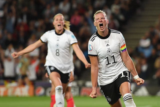 <p>Alexandra Popp celebrates scoring her second goal during Germany’s 2-1 win over France in Wednesday’s semi-final at Stadium MK</p>