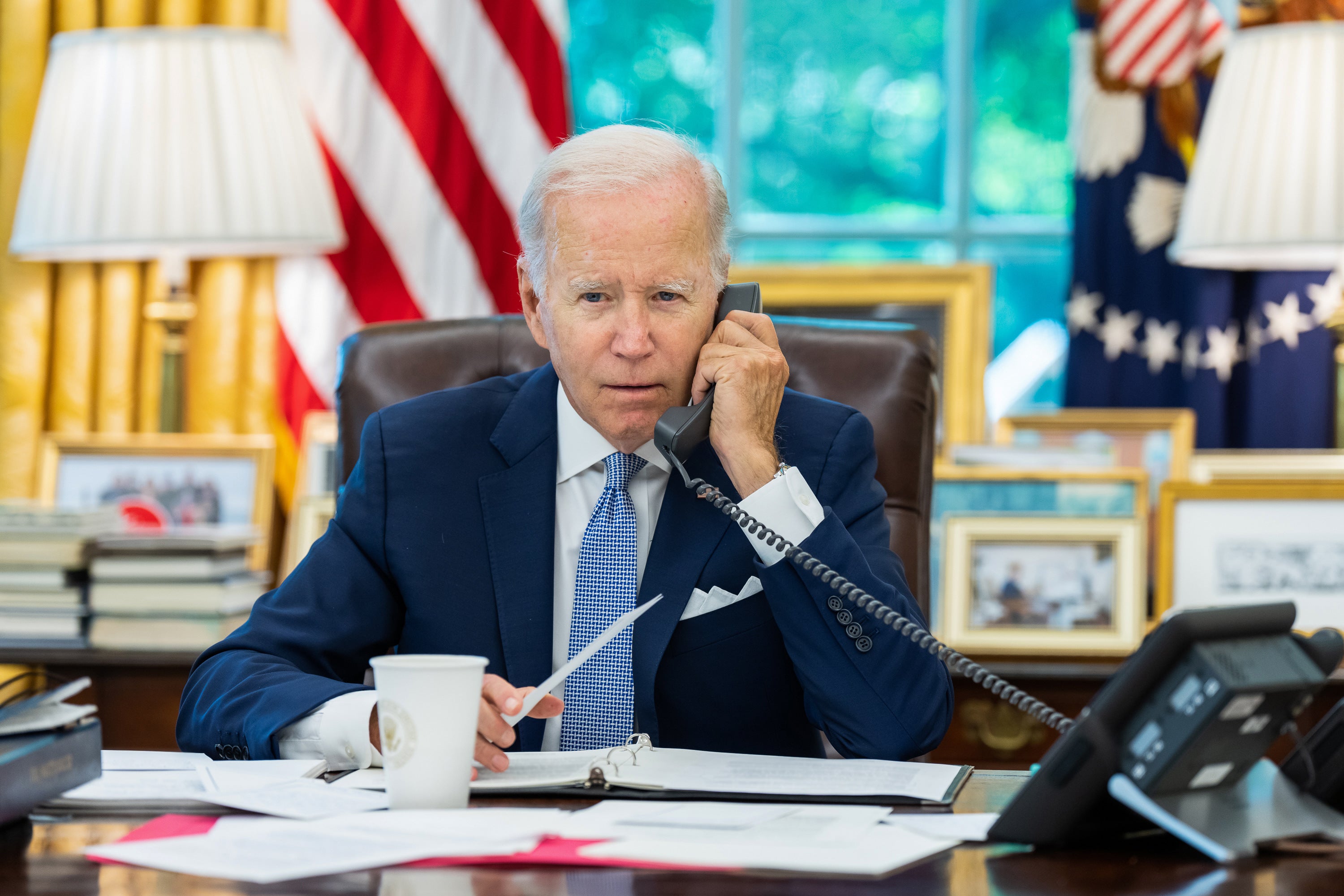 <p>US President Joe Biden speaks during an Oval Office phone call with Chinese leader Xi Jinping</p>