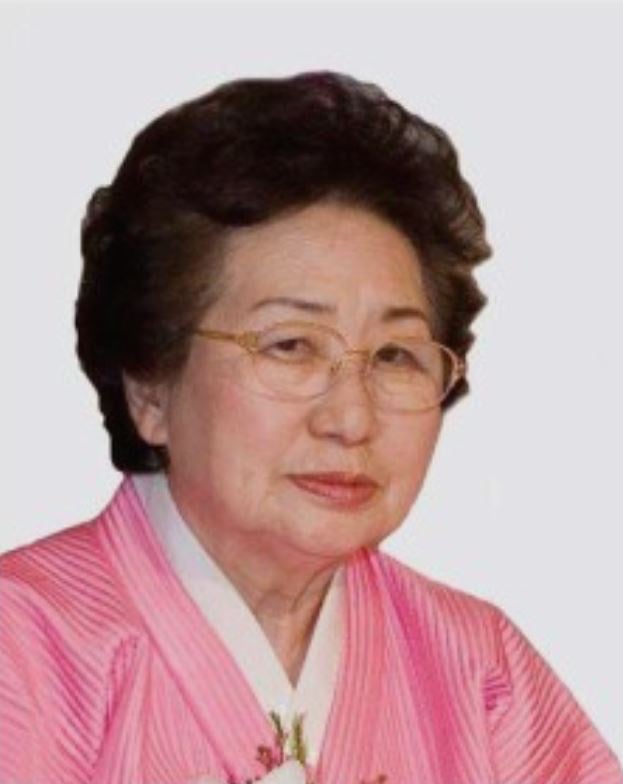 <p>The body of another Korean woman 20 years younger than Kyung Ja Kim, dressed in her clothes and with a nearly identical hairstyle was presented as that of Ms Kim to her family</p>