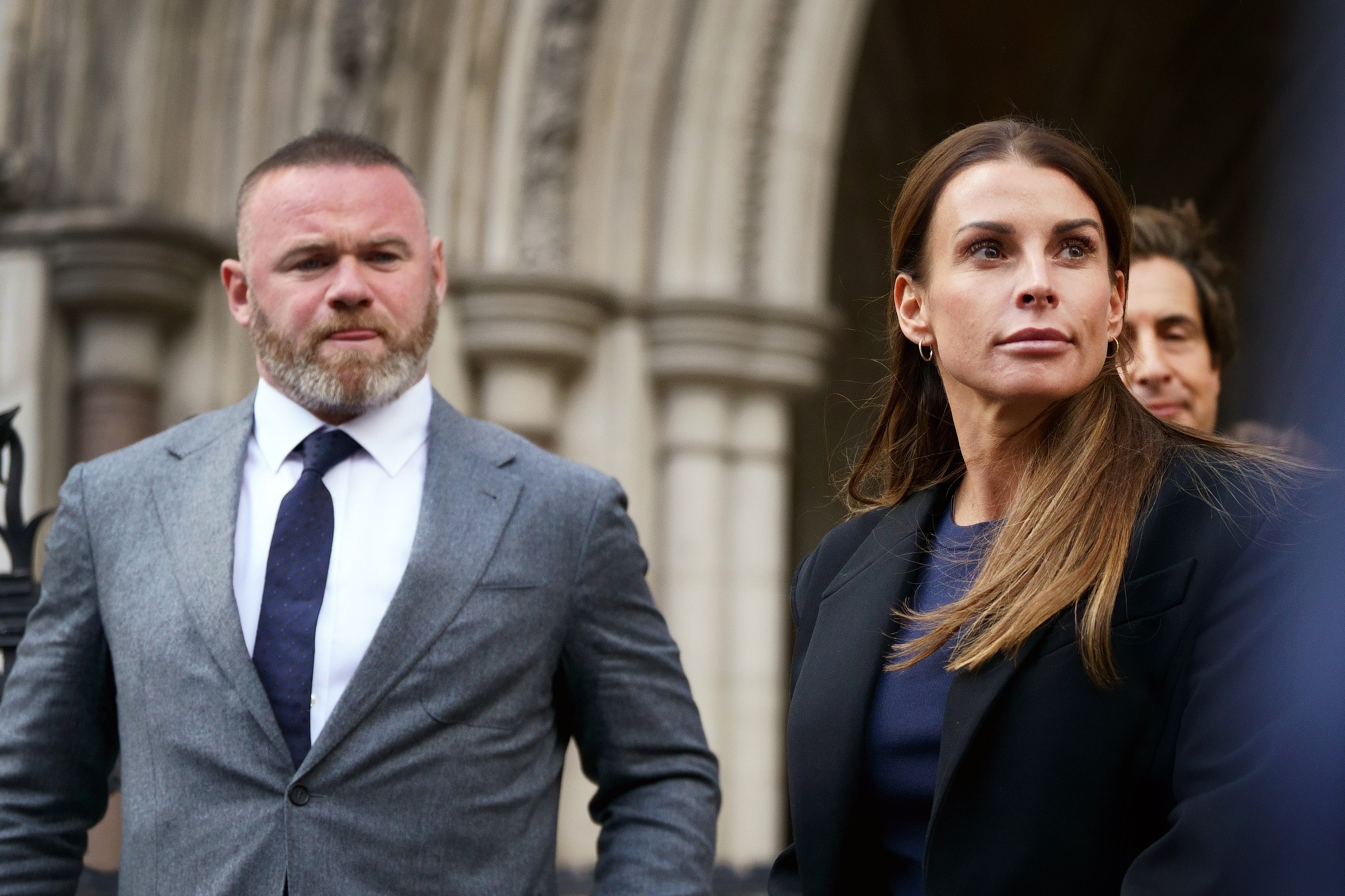 Wayne and Coleen Rooney leave the Royal Courts Of Justice (PA)