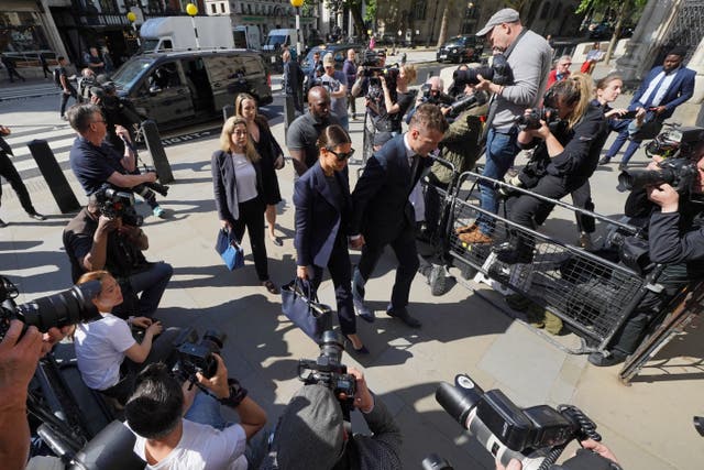 Rebekah and Jamie Vardy arrive at the Royal Courts Of Justice, London, as the high-profile libel battle between Rebekah Vardy and Coleen Rooney continues. Picture date: Tuesday May 17, 2022 (Yui Mok/PA)