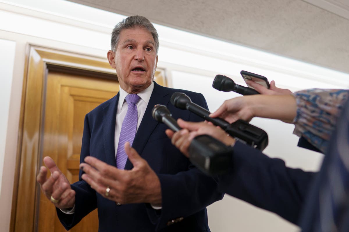 Basement talk, virtual handshake led to Manchin-Schumer deal