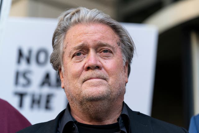 <p>Former White House strategist Steve Bannon, pauses as he departs federal court on Friday, 22 July 2022</p>