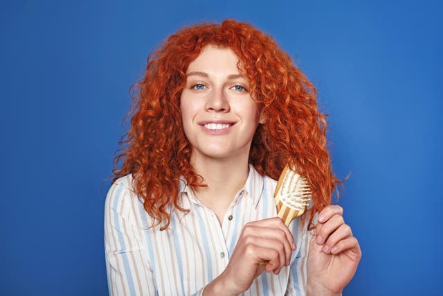 Experts say apple cider vinegar is particularly useful for curly hair (Alamy/PA)
