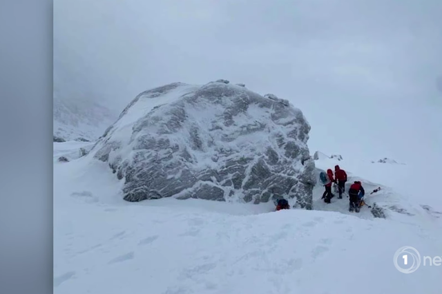 <p>The boulder where the climbers dug a snow cave to spend the night after getting stuck in an avalanche </p>
