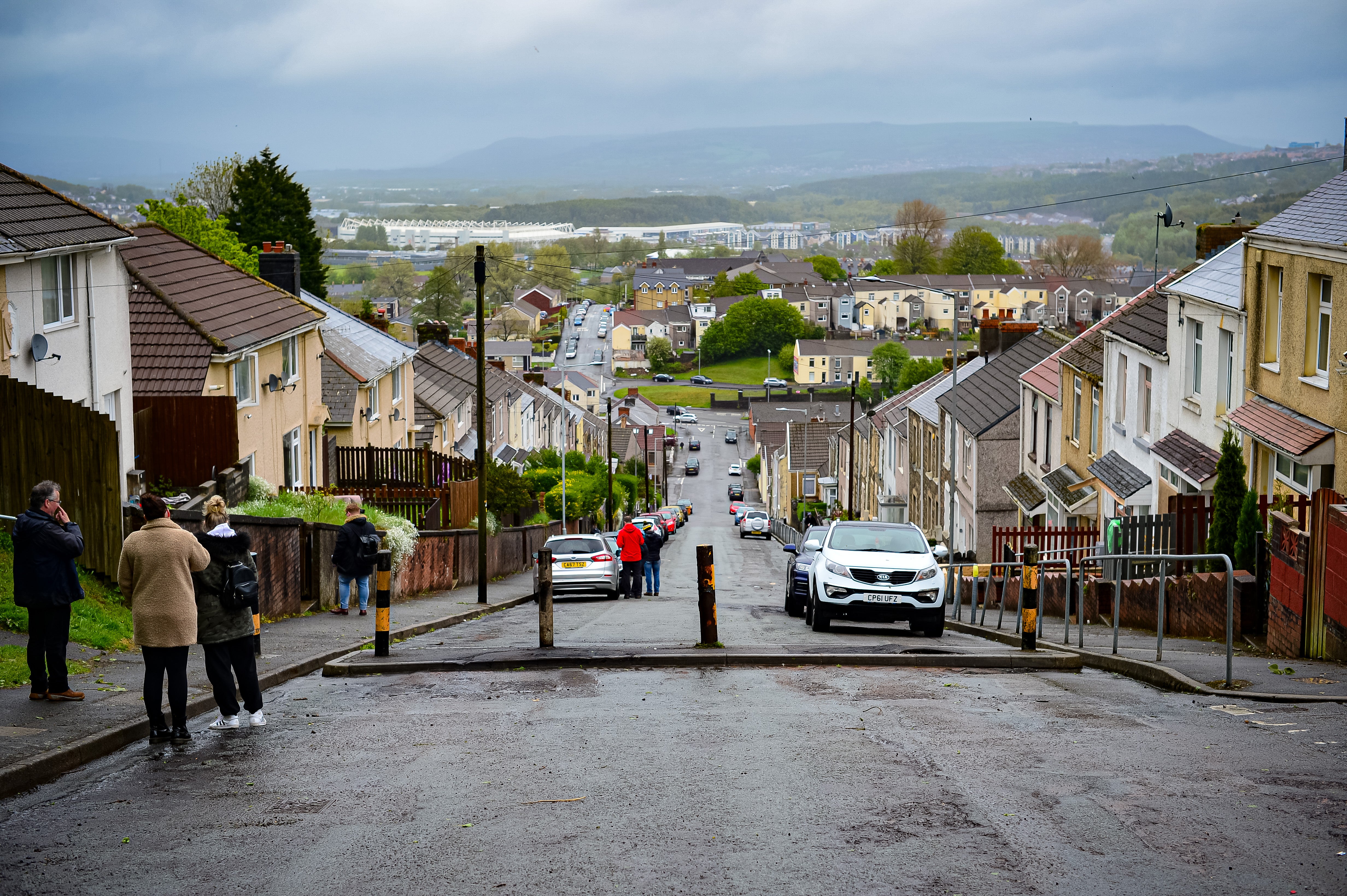 Traffic bollards at the top of Waun Wen Road, Swansea, where large-scale disorder broke out. Picture date: Friday May 21, 2021 (Ben Birchall/PA)