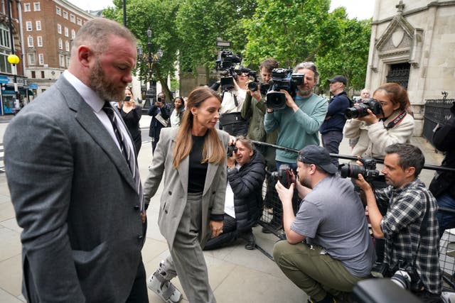 Coleen and Wayne Rooney at the Royal Courts of Justice (Yui Mok/PA)