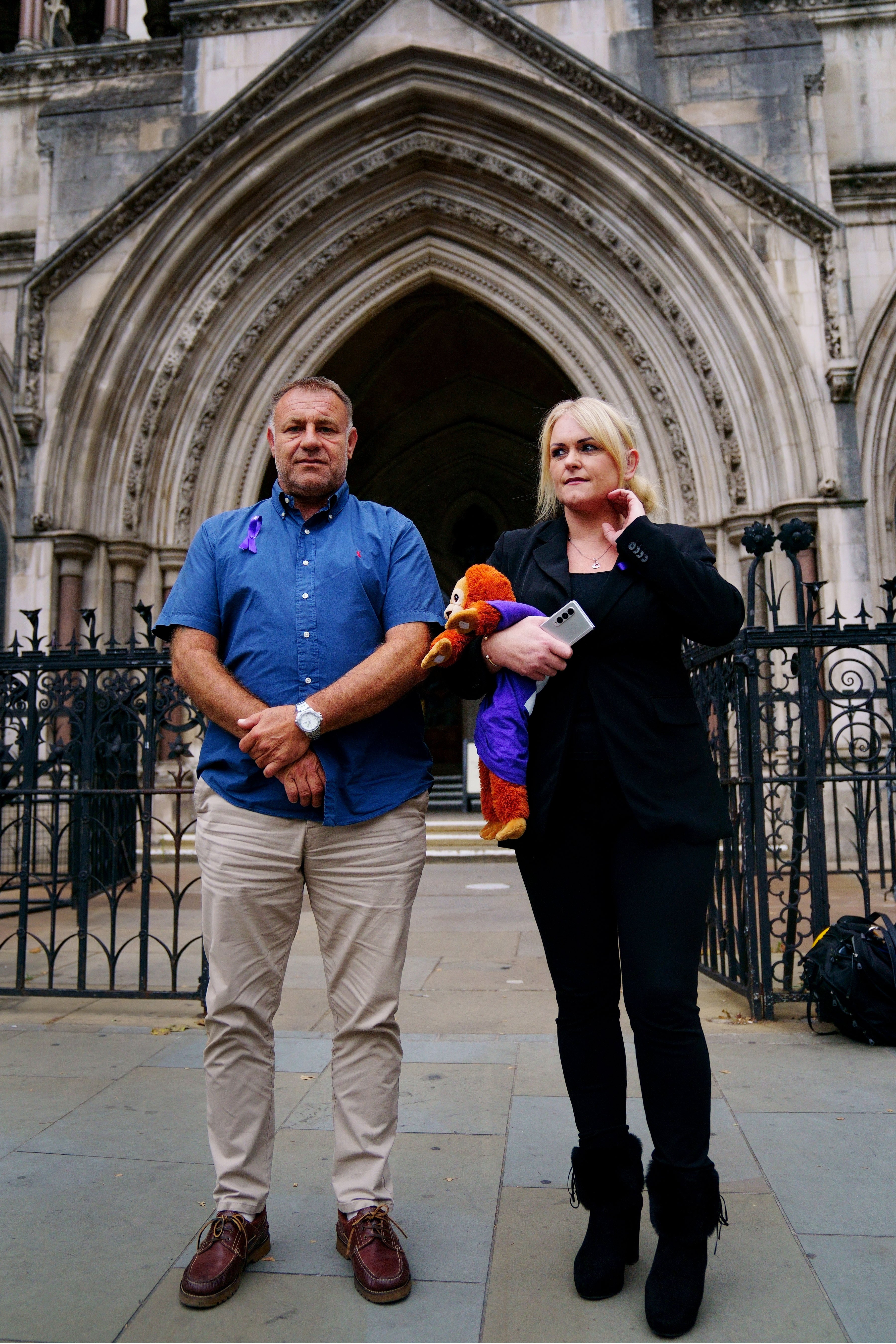 The parents of Archie Battersbee, Paul Battersbee and Hollie Dance, leave the Royal Courts Of Justice (Victoria Jones/PA)