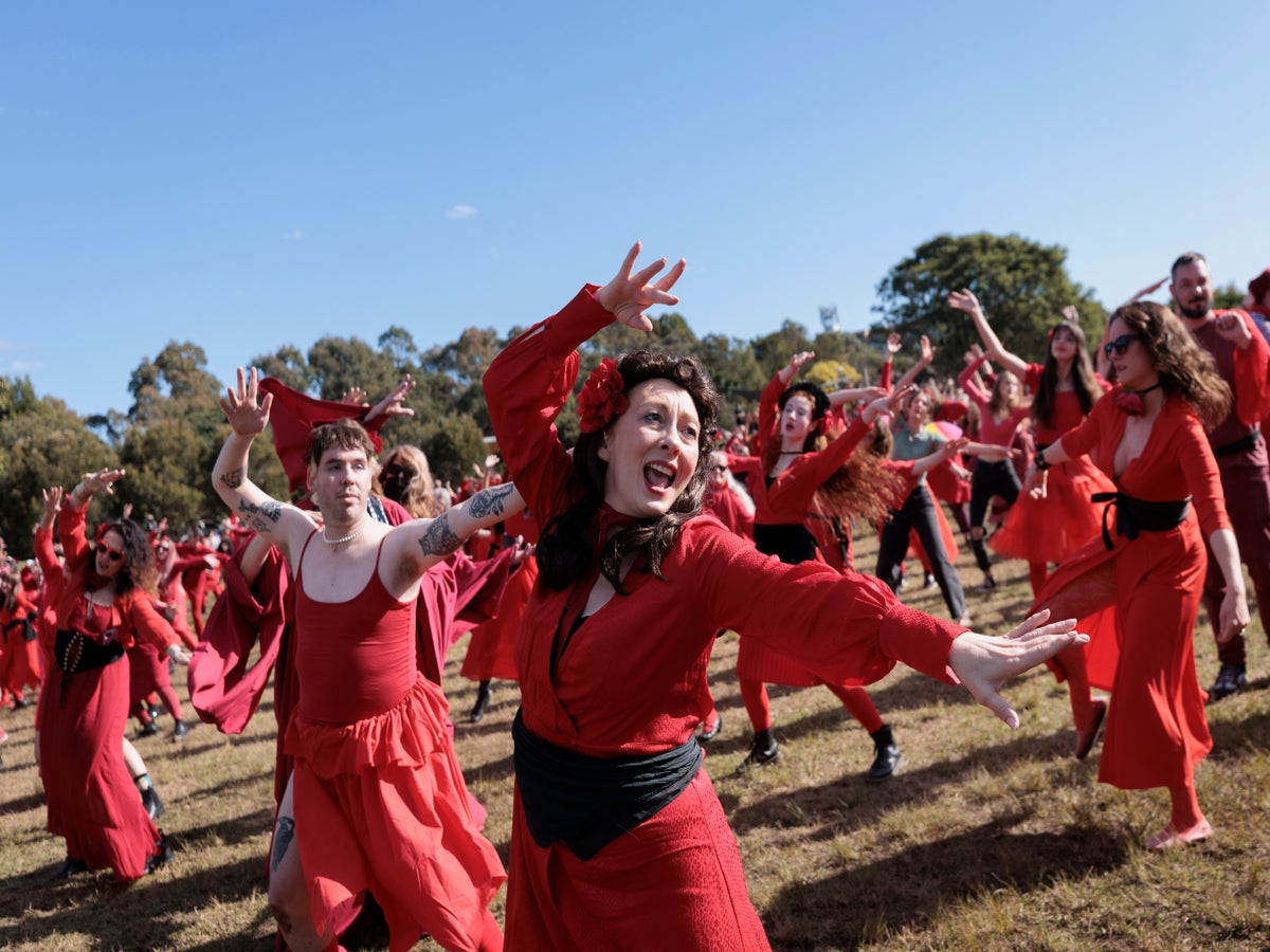 Kate Bush fans gather in red dresses for 'The Most Wuthering Heights Day  Ever' | The Independent