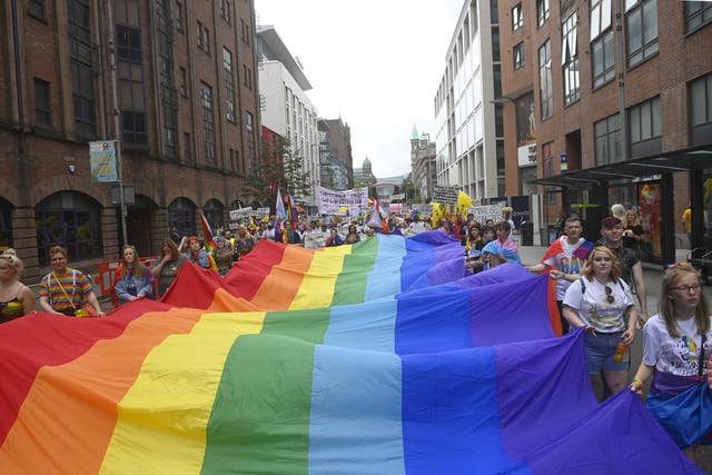 People during Belfast Pride (PA)