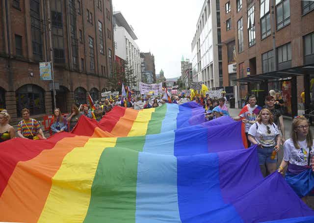 People during Belfast Pride (PA)