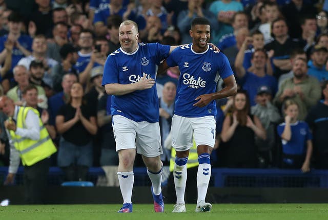 Paul Stratton, left, celebrates with Mason Holgate after being given the chance to score a penalty for Everton (Barrington Coombs/PA)