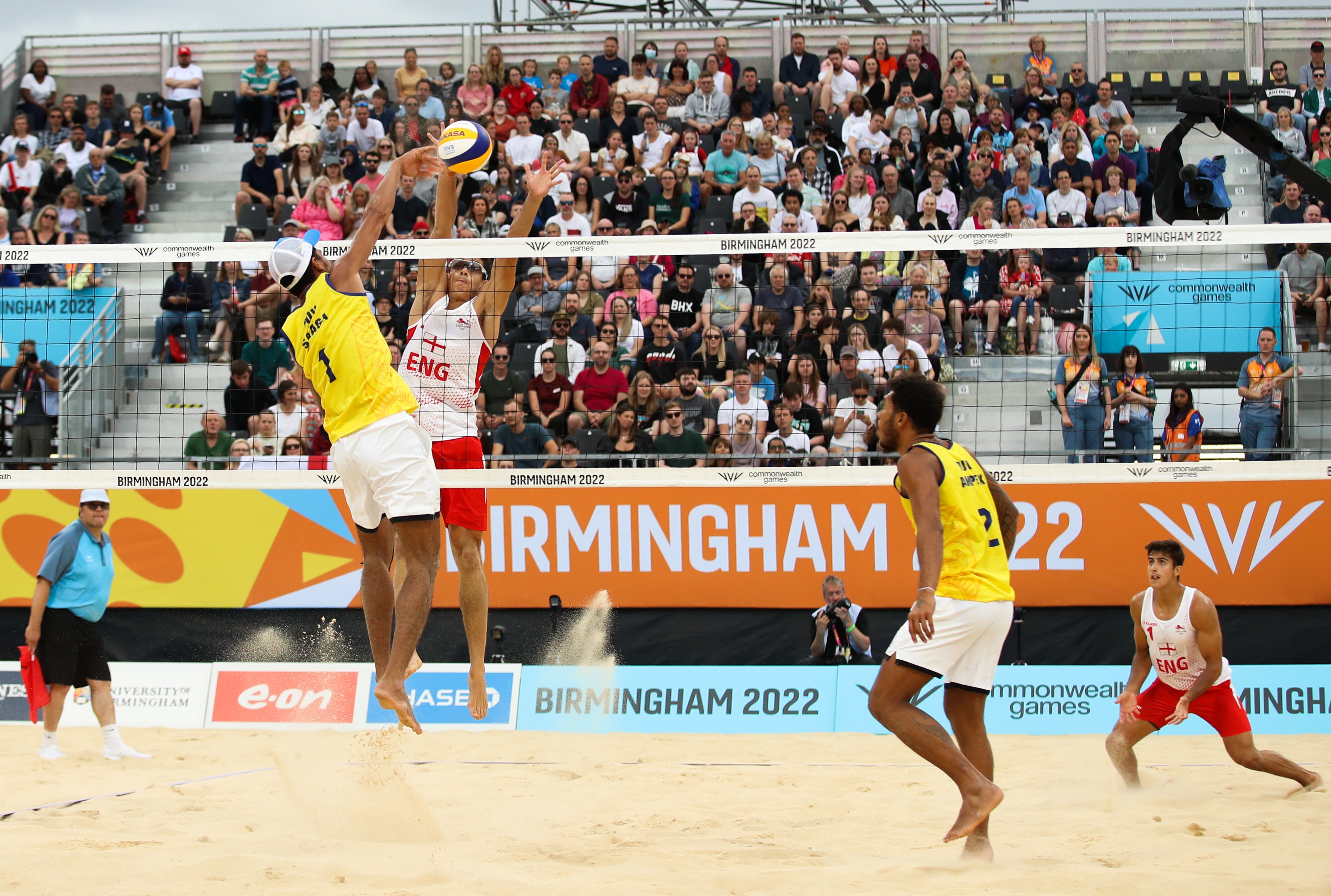 England’s Joaquin Bello and Tuvalu’s Ampex Isaac at Smithfield in the beach volleyball on Saturday (Isaac Parkin/PA).