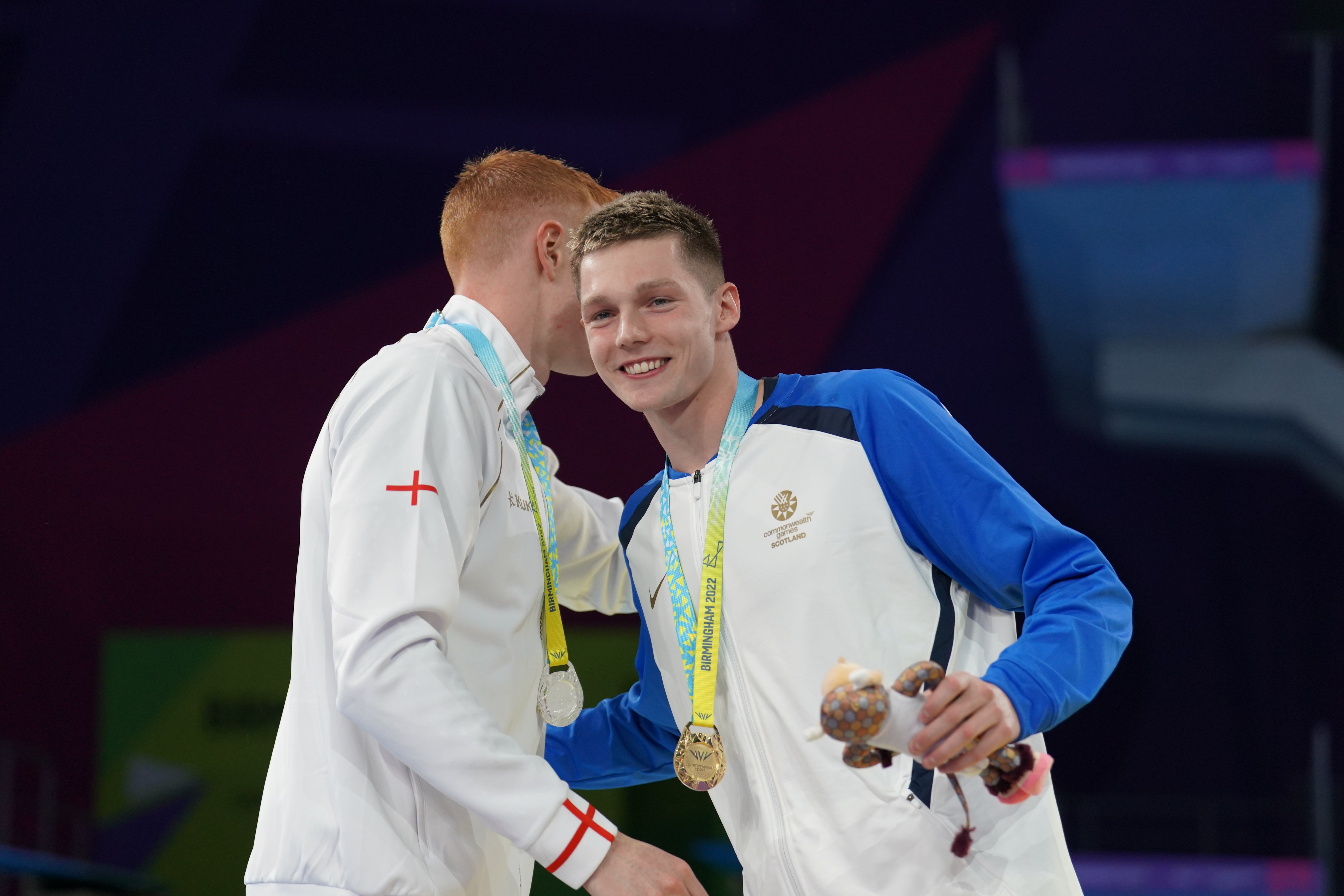 Duncan Scott (right) is congratulated by Tom Dean after winning gold (David Davies/PA)