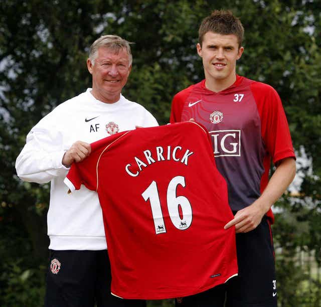 Sir Alex Ferguson (left) welcomed Michael Carrick (right) to Manchester United in 2006 (Peter Byrne/PA)