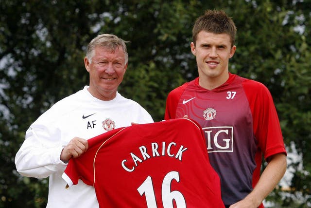Sir Alex Ferguson (left) welcomed Michael Carrick (right) to Manchester United in 2006 (Peter Byrne/PA)