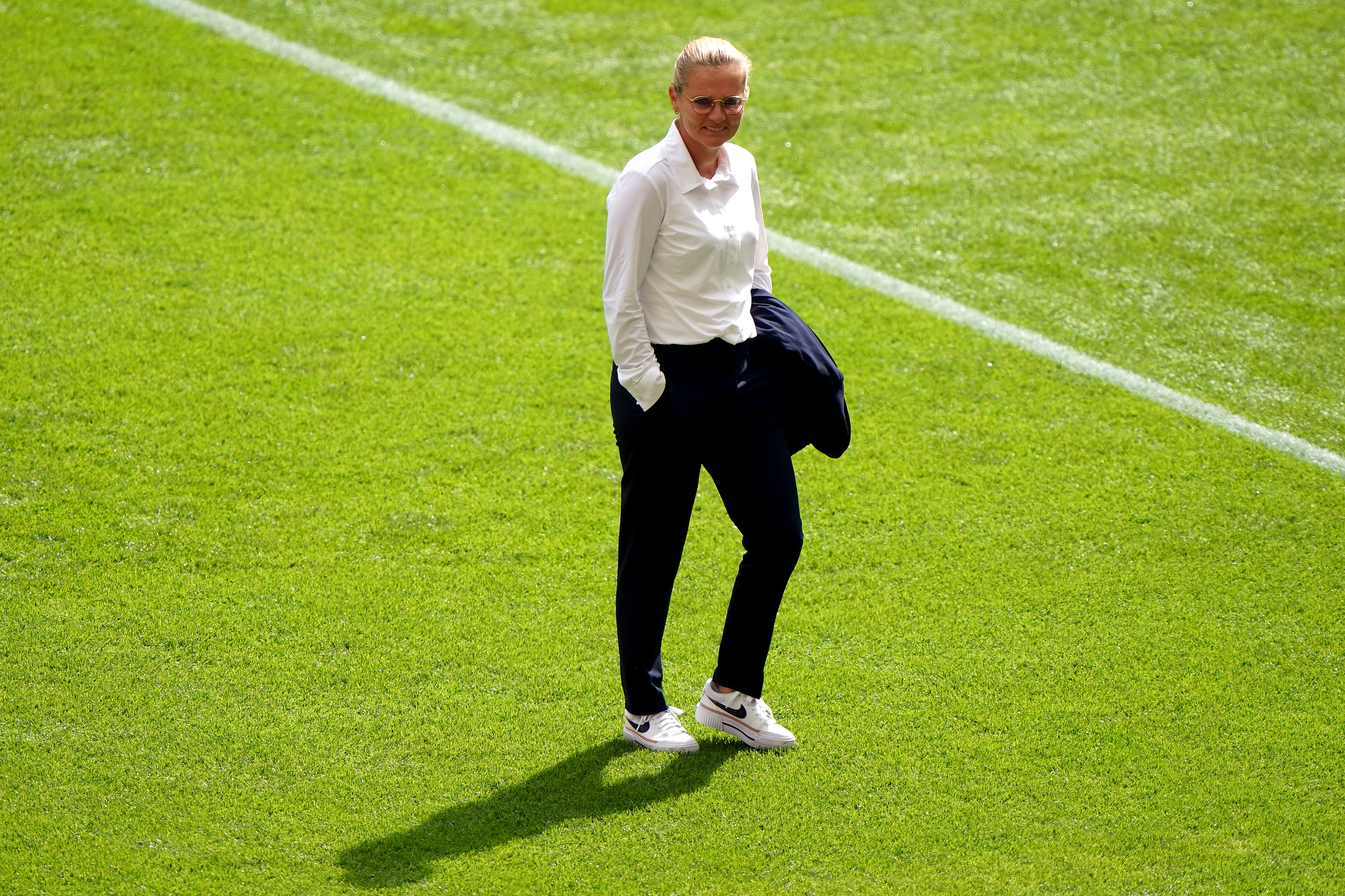 Sarina Wiegman, trademark jacket tucked under her arm, before the Euro 2022 final (Joe Giddens/PA)
