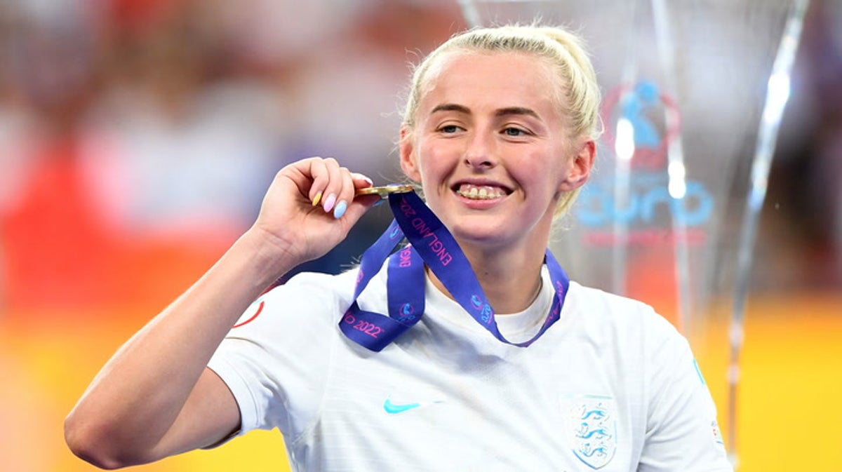 Excited Chloe Kelly runs off with reporter’s microphone after England win Euro final