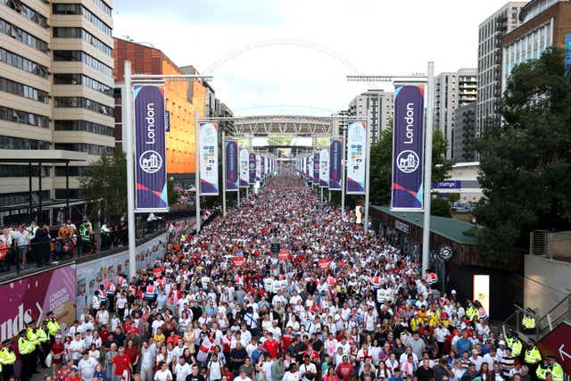 England fans make their way from the stadium after the final (PA)