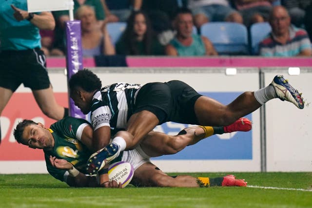 South Africa’s Muller Du Plessis scores a try against Fiji in the men’s rugby sevens gold medal match at Coventry (Jacob King/PA)
