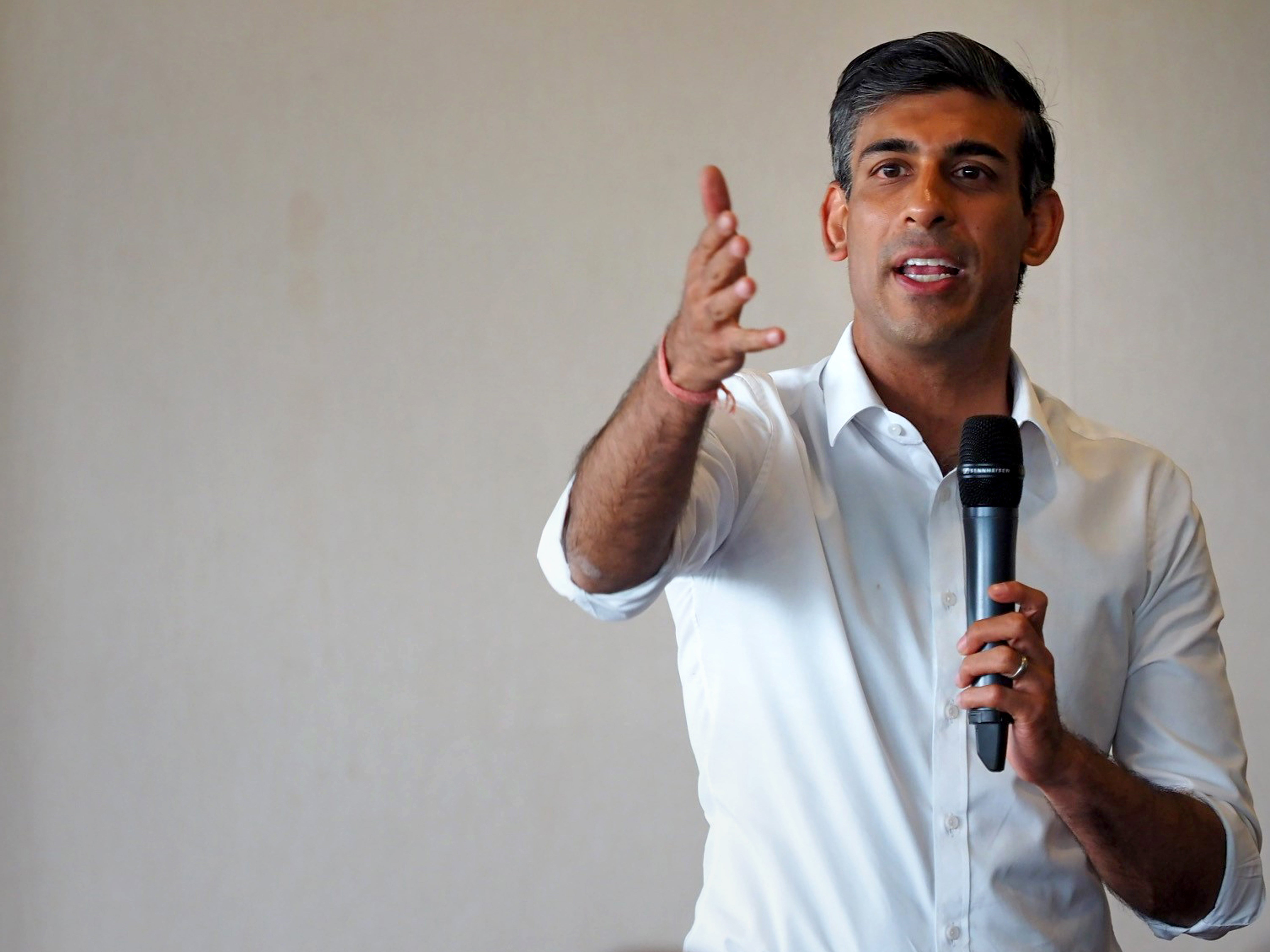 Rishi Sunak has committed to cutting the basic rate of income tax (Joe Sene/PA)