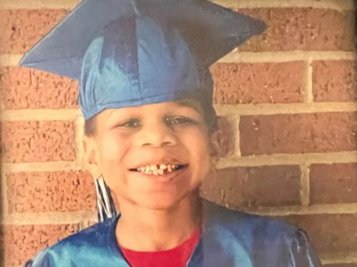 Adoptive father of seven-year-old boy found dead in washing machine says door to home was unlocked