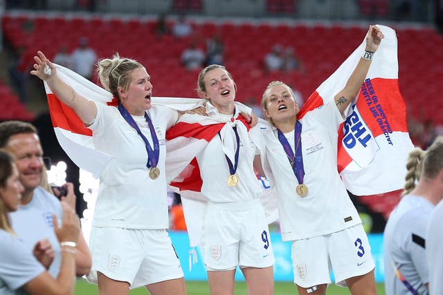 Millie Bright, Ellen White and Rachel Daly celebrate England’s Euro 2022 final victory over Germany (Nigel French/PA Images).