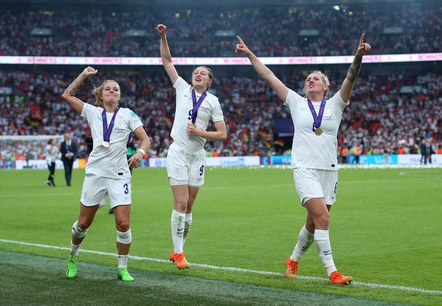 England trio Rachel Daly, Ellen White and Millie Bright sing out in the post-match celebrations (Nigel French/PA)