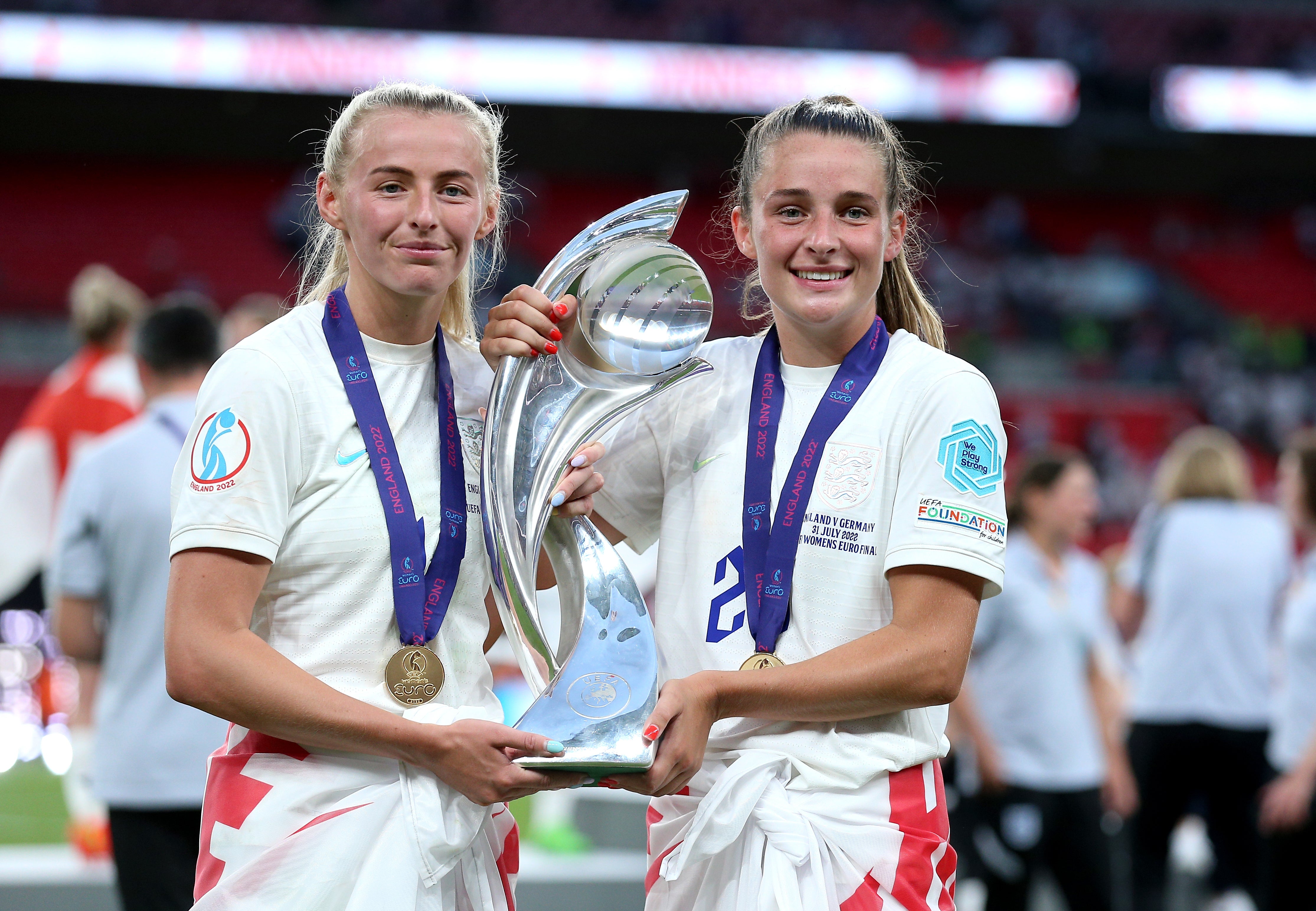 England’s Chloe Kelly (left) and Ella Toone celebrate with the trophy after England win the Euro 2022 final at Wembley (Nigel French/PA)