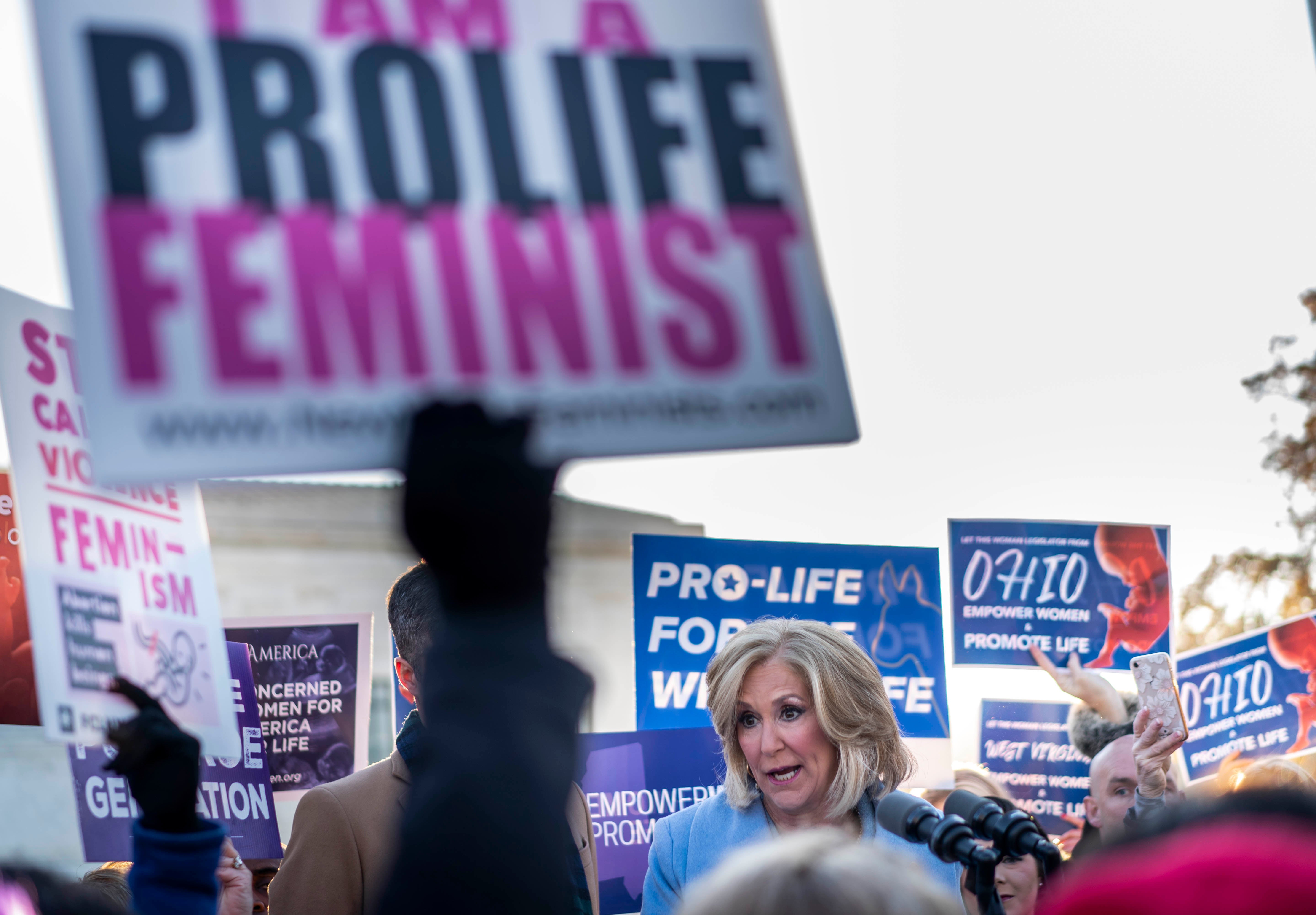 Mississippi Attorney General Lynn Fitch, right, speaks to supporters