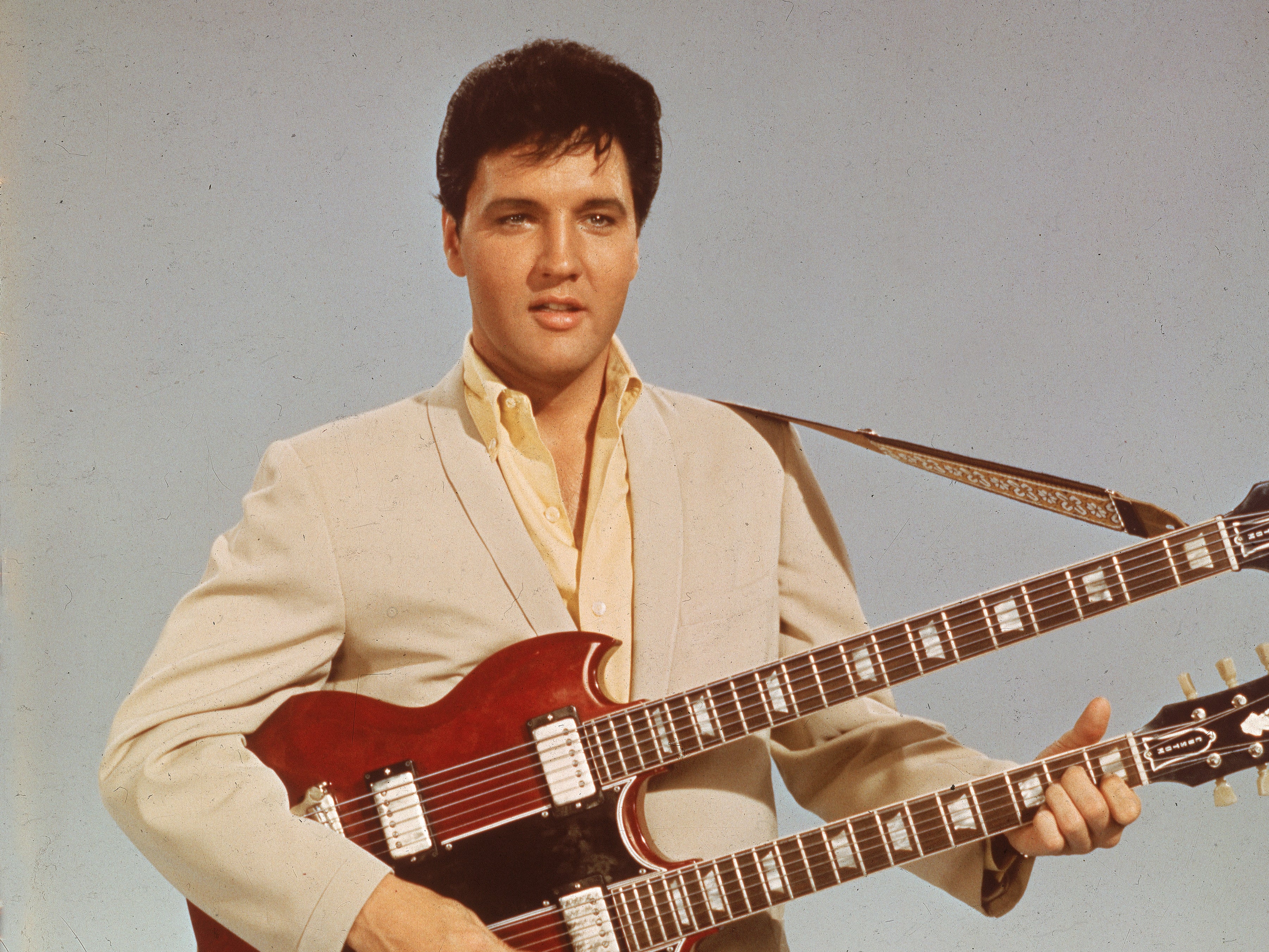 Elvis Presley jewelry, guitar up for auction