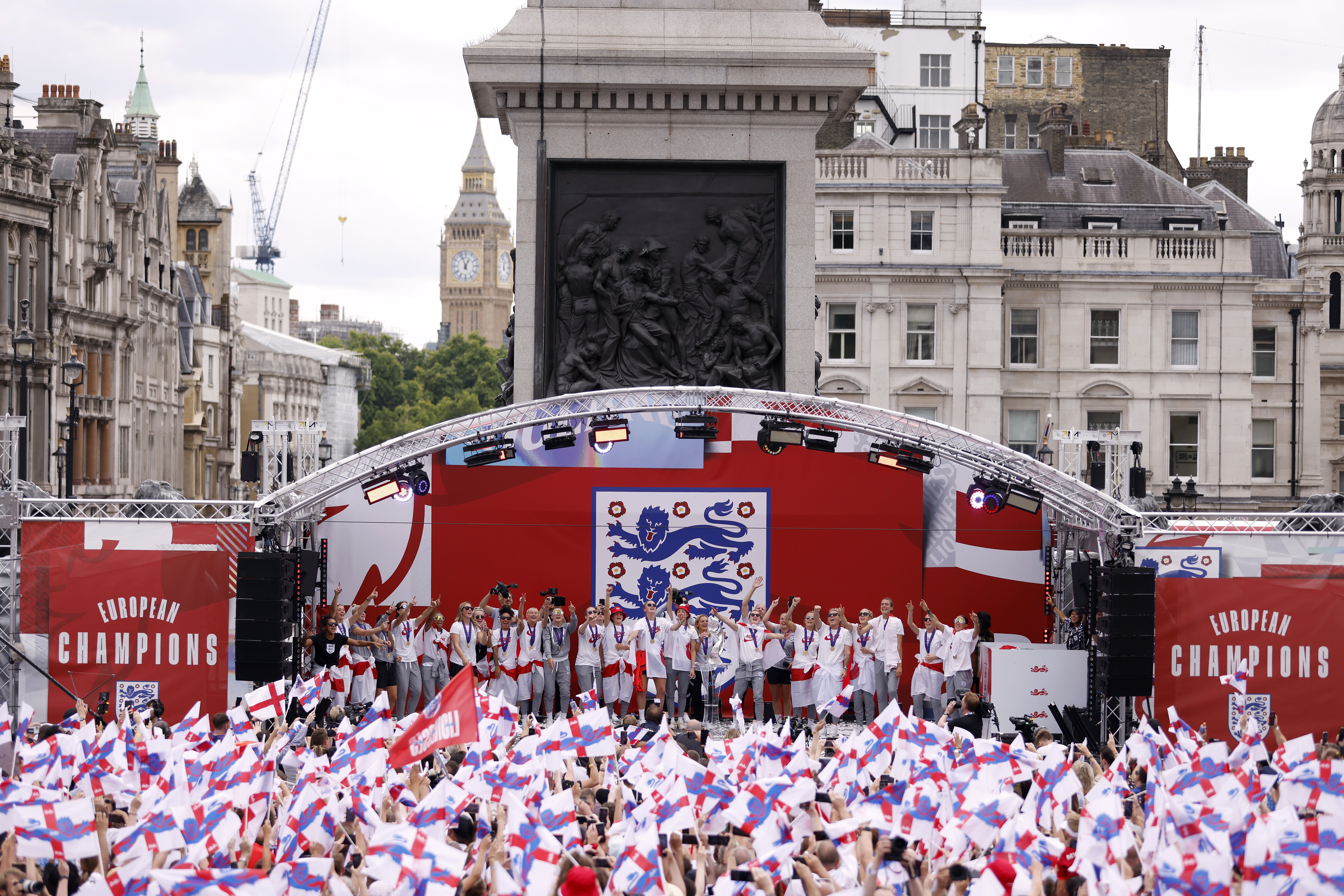 England players sing with supporters in Trafalgar Square (Steven Paston/PA)