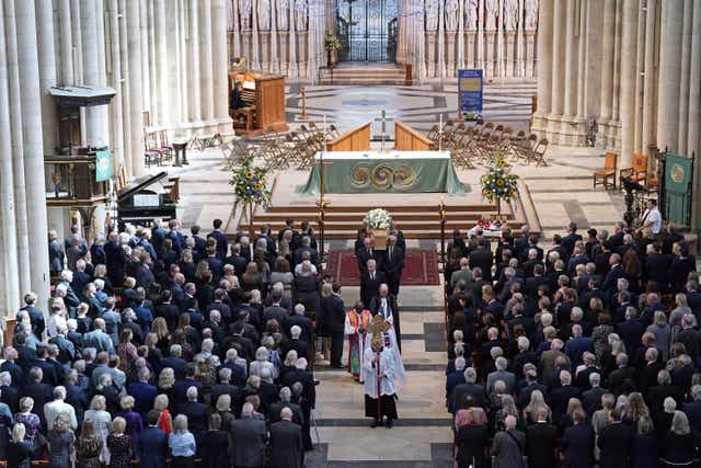 The coffin of Harry Gration leaves a service of thanksgiving for the BBC presenter at York Minster in York (Danny Lawson/PA)