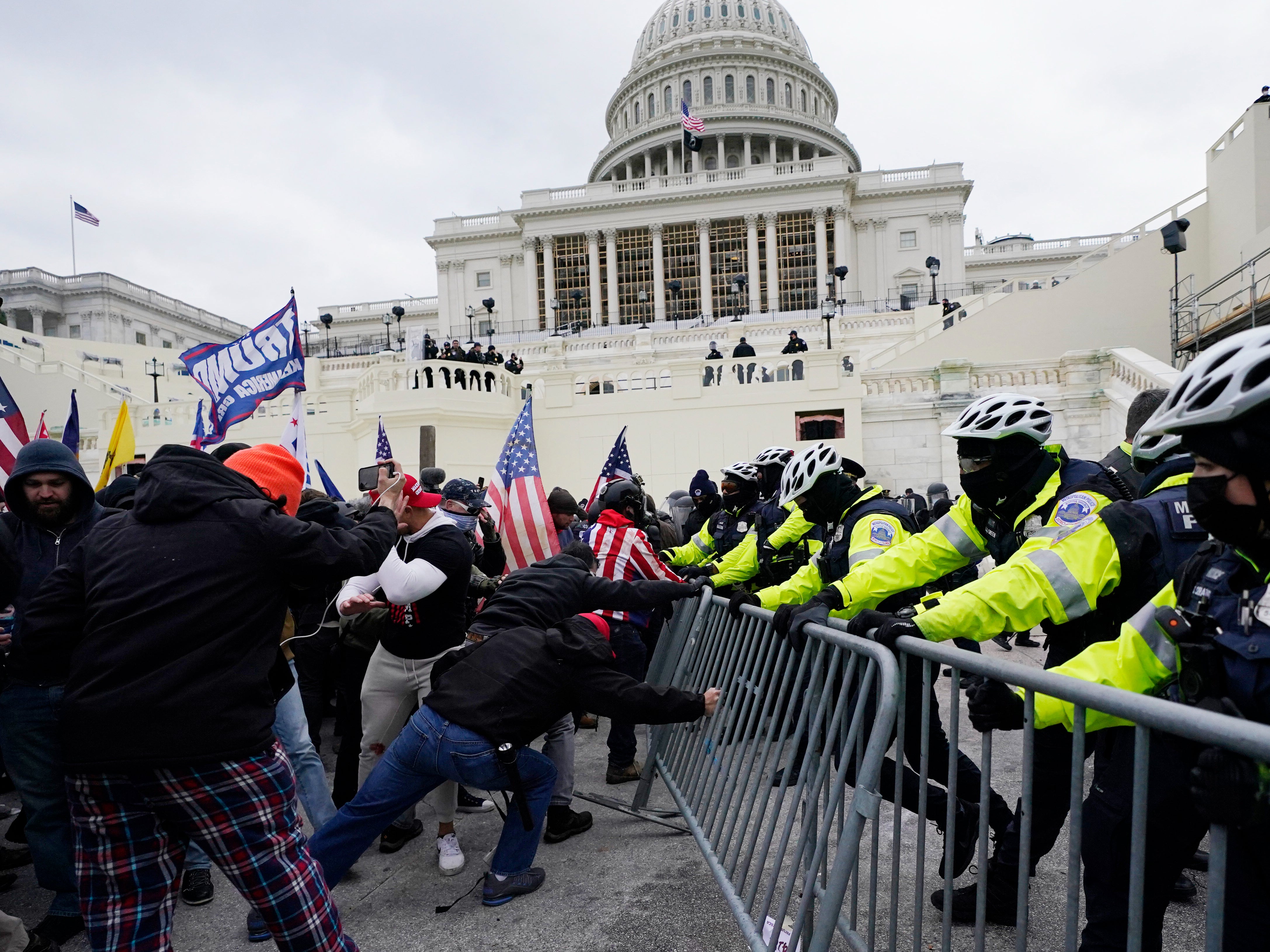 Rioters attack police at the US Capitol, 6 Jan 2021