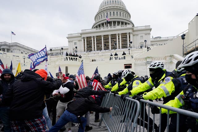 <p>Rioters attack police at the US Capitol, 6 Jan 2021</p>