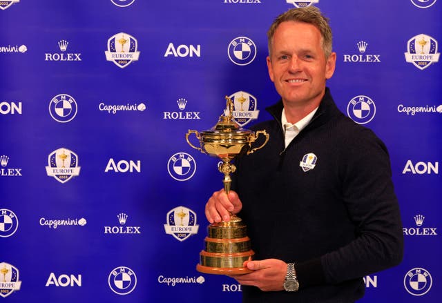 <p>Luke Donald poses with the Ryder Cup after being announced as Europe’s new captain</p>