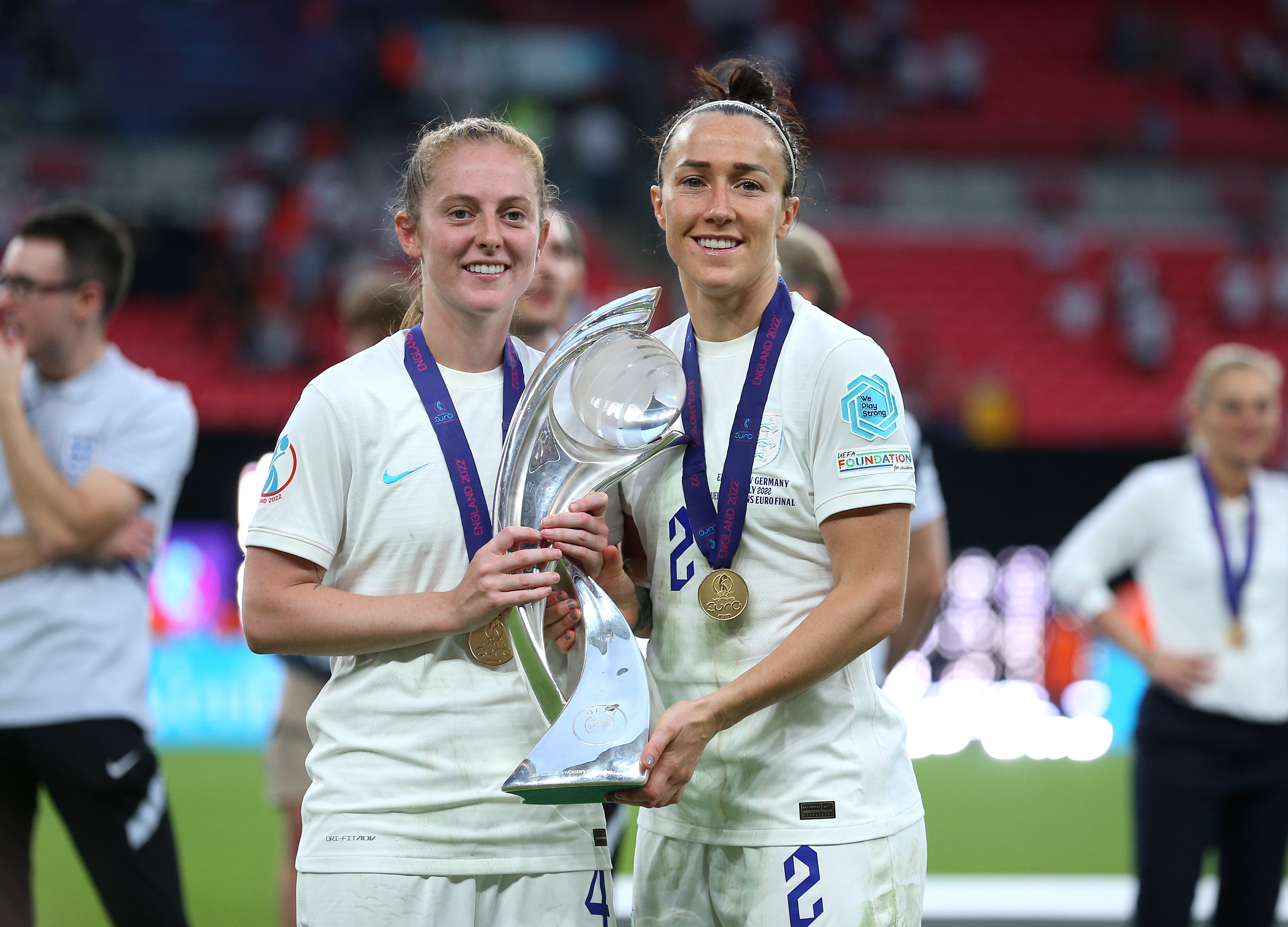 Keira Walsh, left, and Lucy Bronze celebrate England’s success (Nigel French/PA)