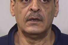 Father accused of killing his two daughters before going on the run for 12 years finally faces trial