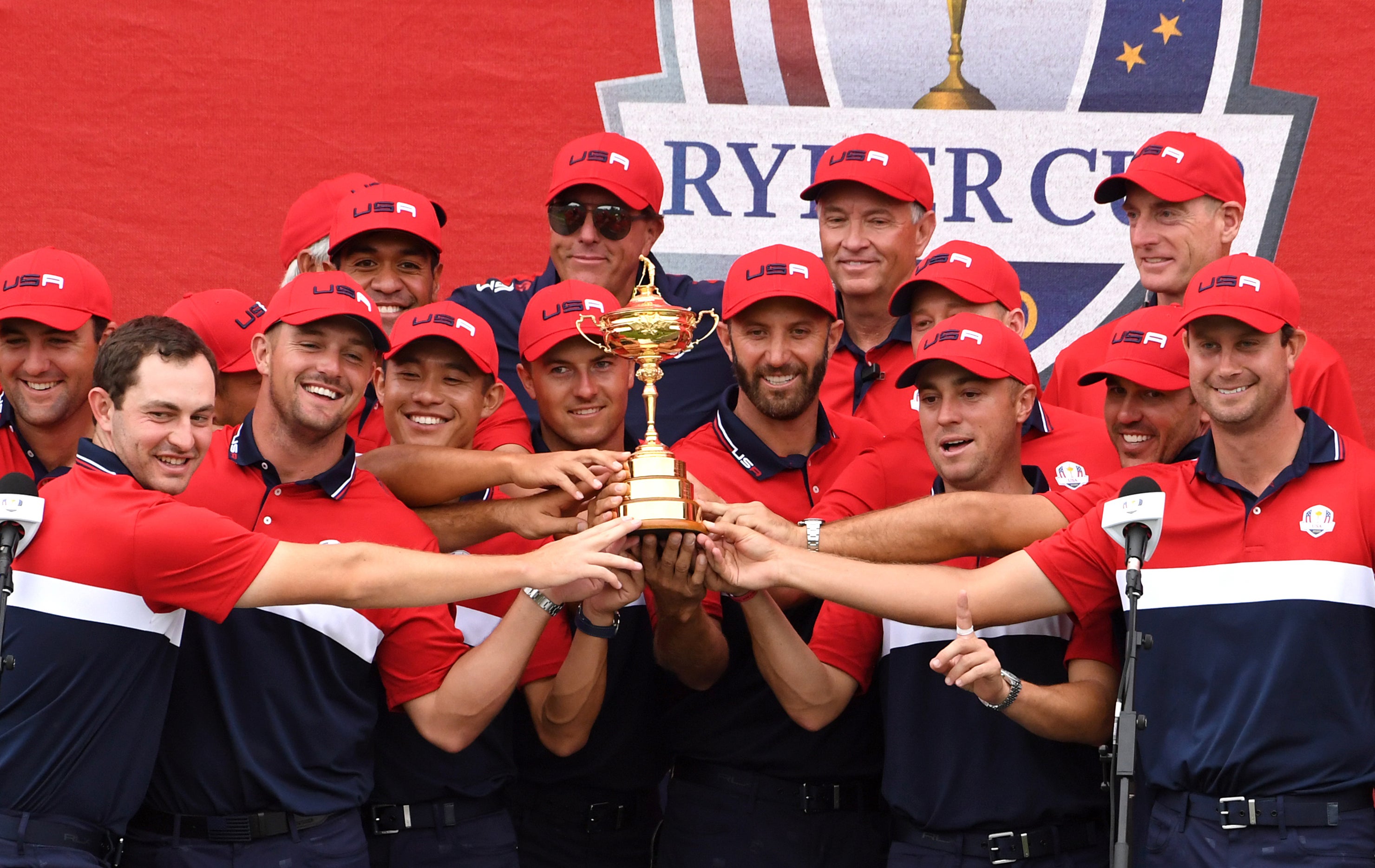 Team USA celebrate with the Ryder Cup trophy after beating Europe 19-9 at Whistling Straits (Anthony Behar/PA)