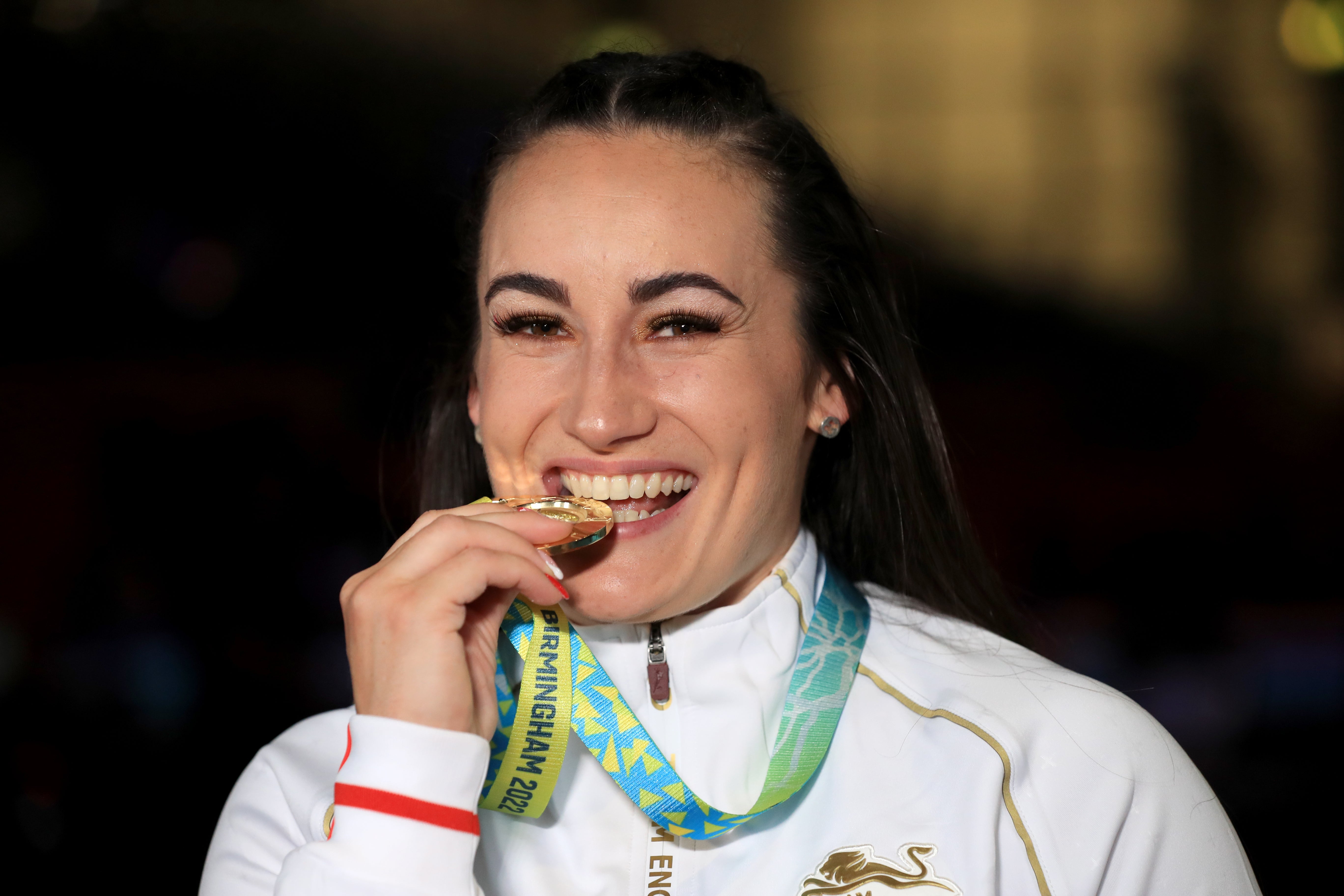 England’s Sarah Davies poses with her gold medal after winning the women’s 71kg Commonwealth title in Birmingham (Bradley Collyer/PA)