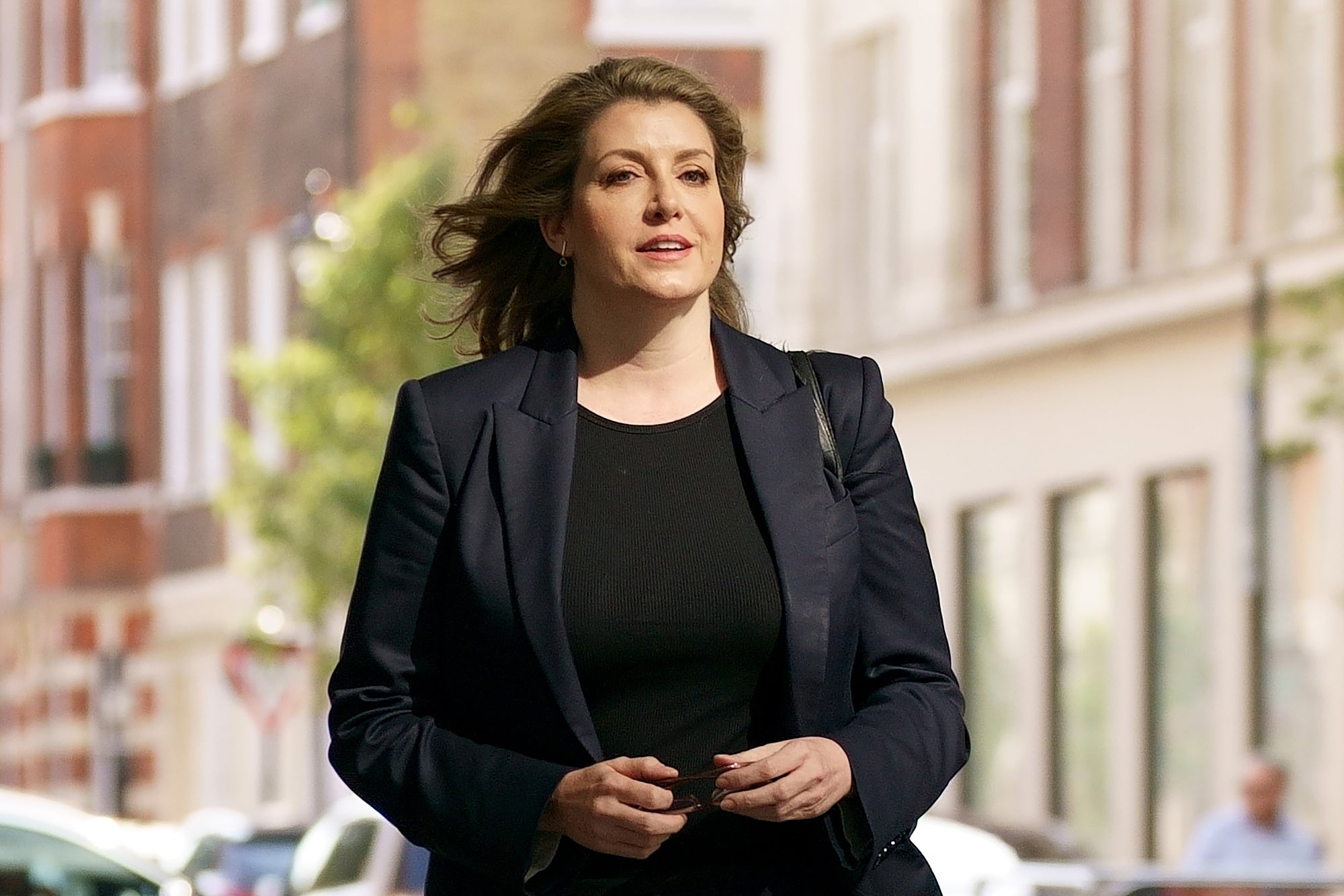 Penny Mordaunt labelled Liz Truss the “hope candidate” as she made a surprise return to the Tory leadership race to endorse her former rival (Victoria Jones/PA)