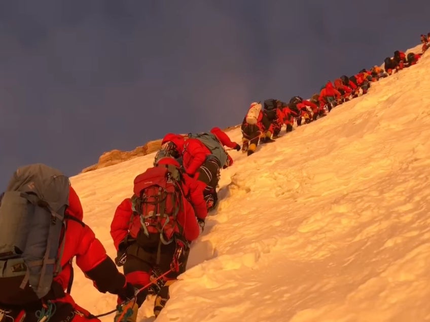 Climbers wait in long queues on deadly Himalayan summit