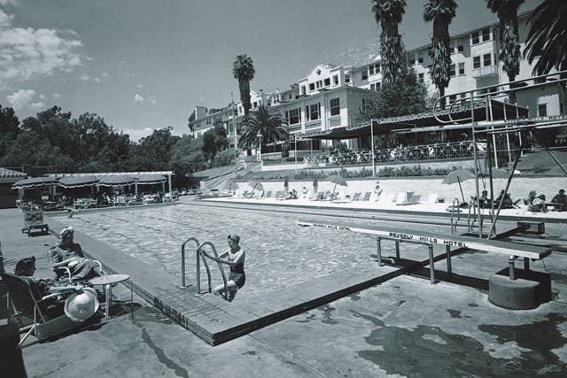 <p>The hotel’s swimming pool, seen here in 1938, was ringed by golden sand shipped in especially from Arizona and has seen its fair share of sensational activity</p>