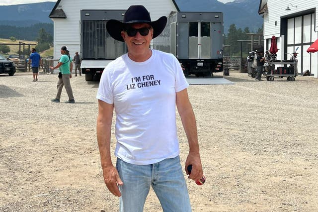 <p>Actor Kevin Costner wears a ‘I’m with Liz Cheney’ t-shirt while filming the television series Yellowstone</p>
