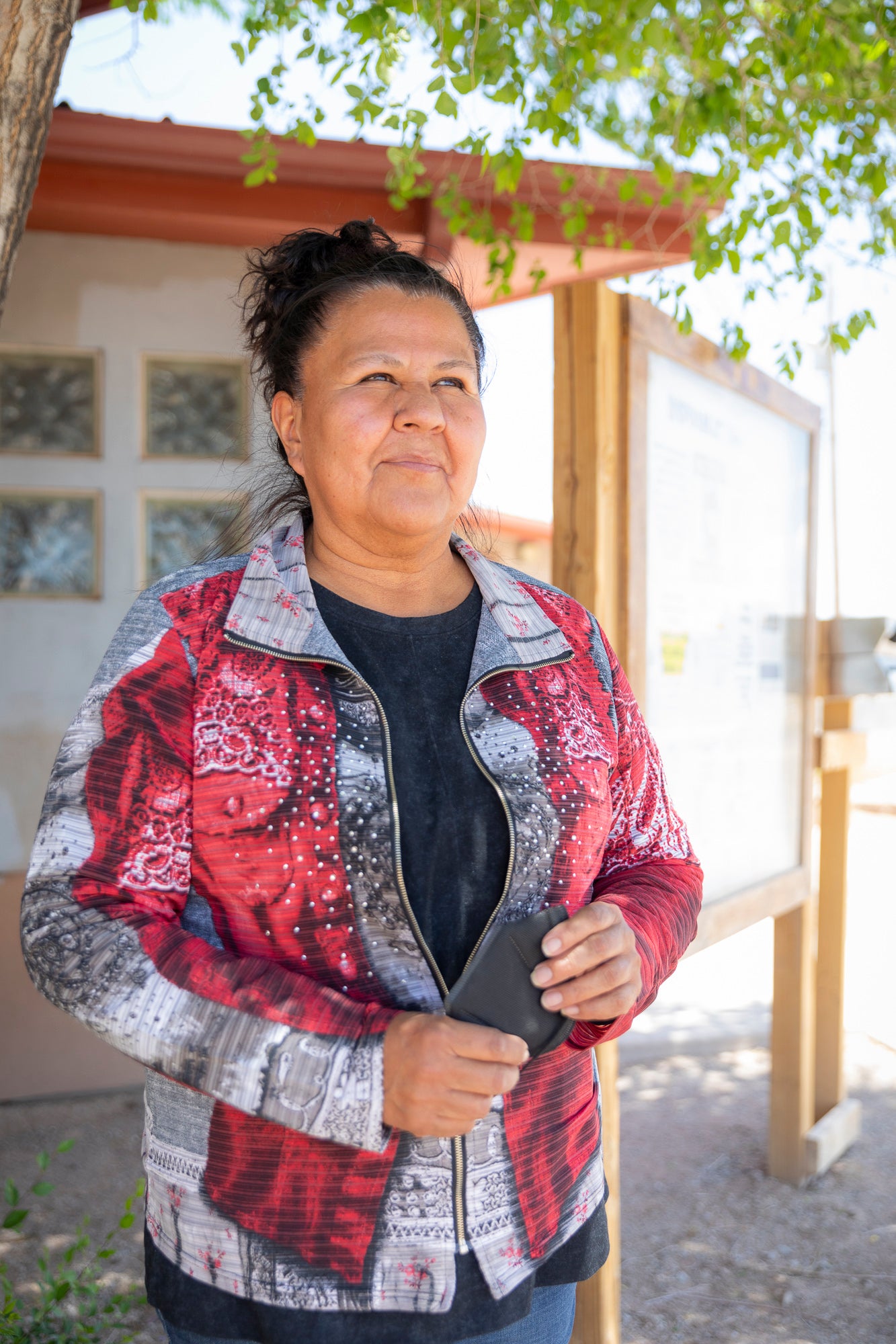 Cindy Howe, manager of the Navajo Water Project, outside the Baca/Prewitt Chapter house in Prewitt, New Mexico