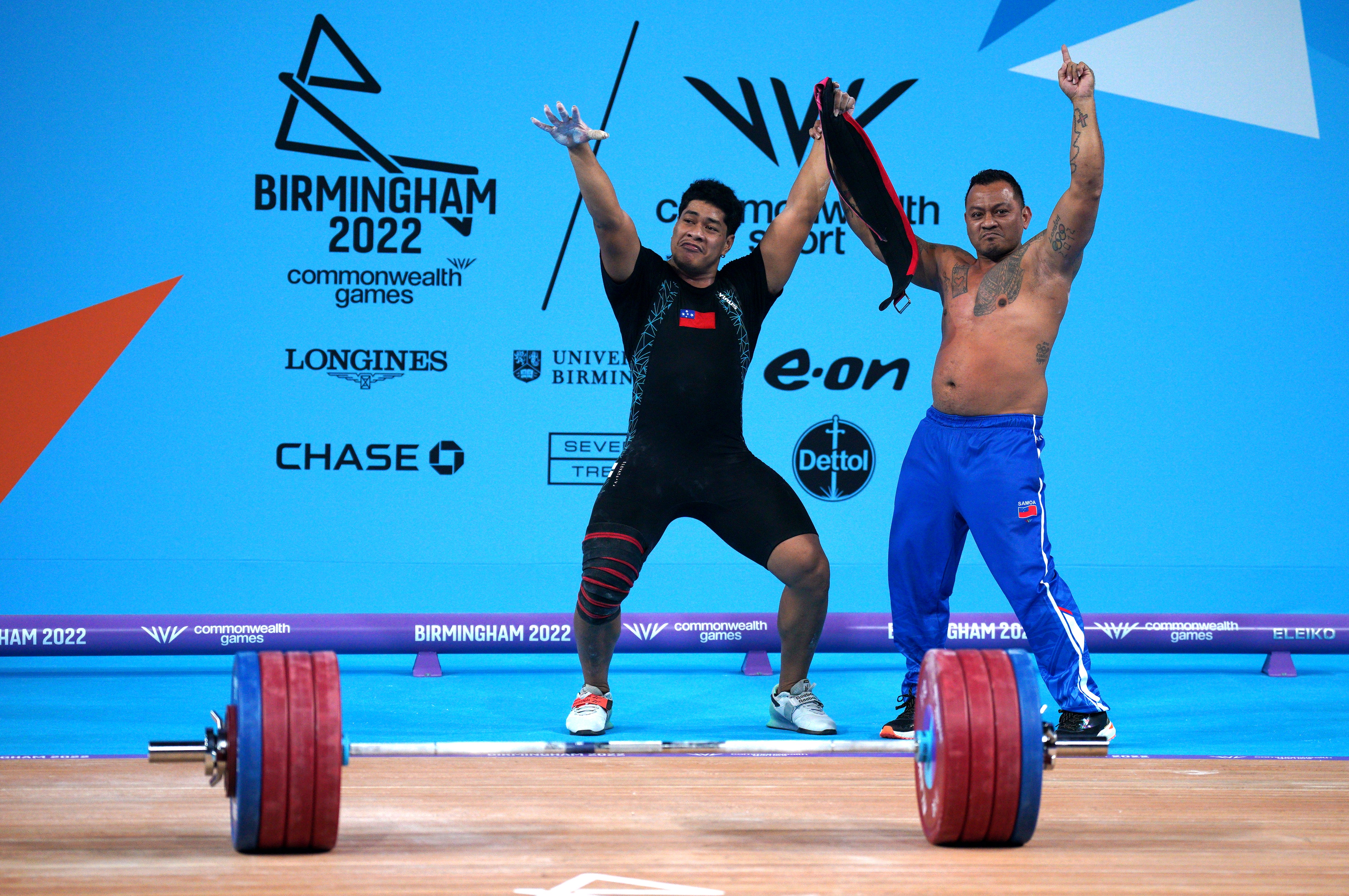Samoa’s Don Opeloge celebrates winning the men’s weightlifting competition (Peter Byrne/PA)